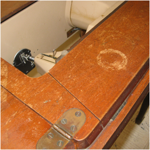 Water damaged from a hurricane, this mid-century Singer Sewing Machine cabinet got a makeover. MotherDaughterProjects.com