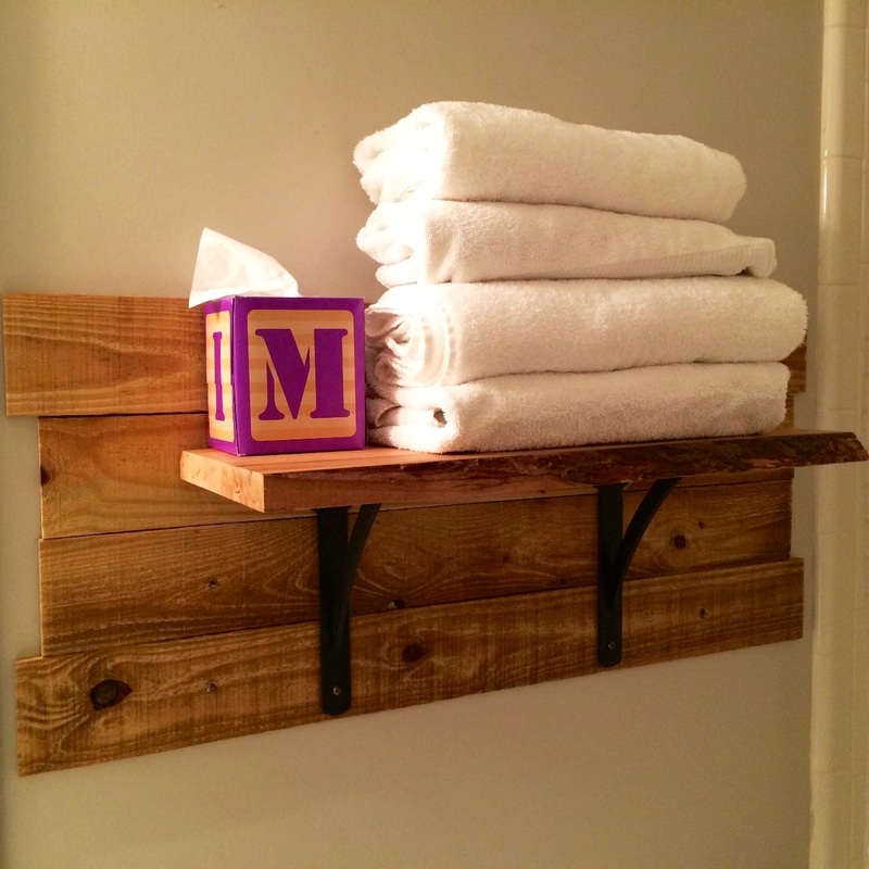 A simple live-edge shelf makes a big statement in a guest bath. MotherDaughterProjects.com