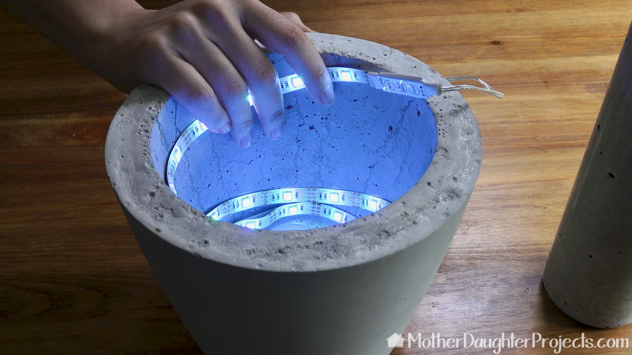 Learn how to cast concrete to make a lamp base and lamp shade. This modern LED light would look great on an end table or night stand.