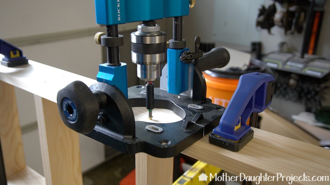 This Rockler portable drill press is one of the best tools we've recently purchased. With it, Steph was able to precisely screw the screws into place. 