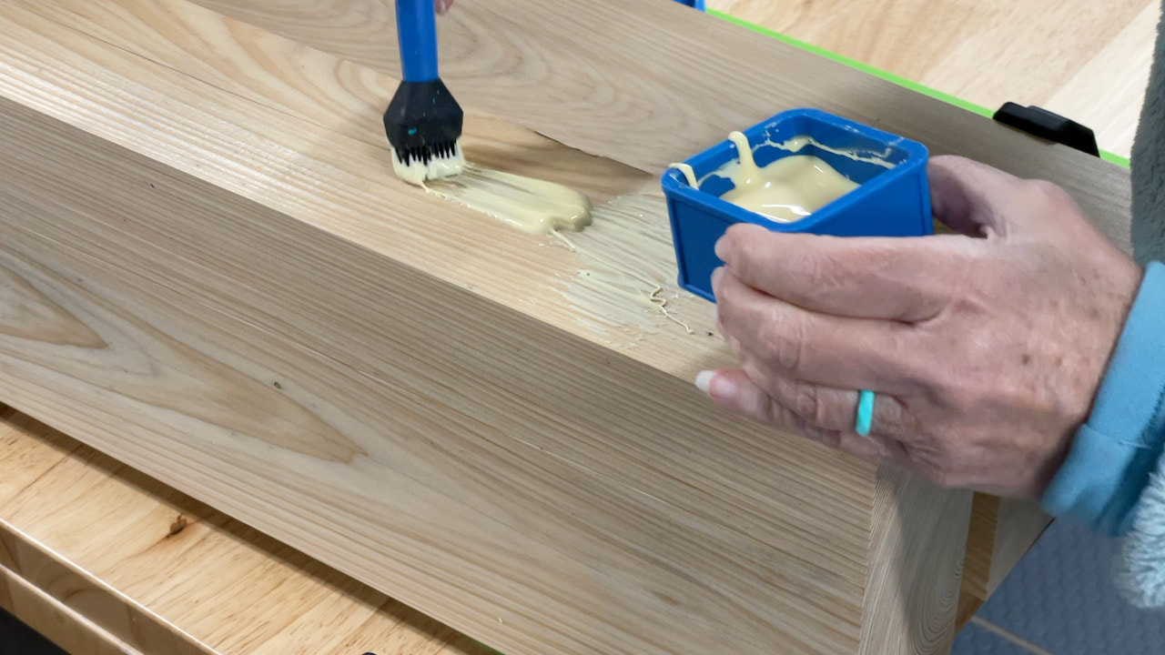 We used a Rockler glue brush and covered glue containers to add glue to the boards.
