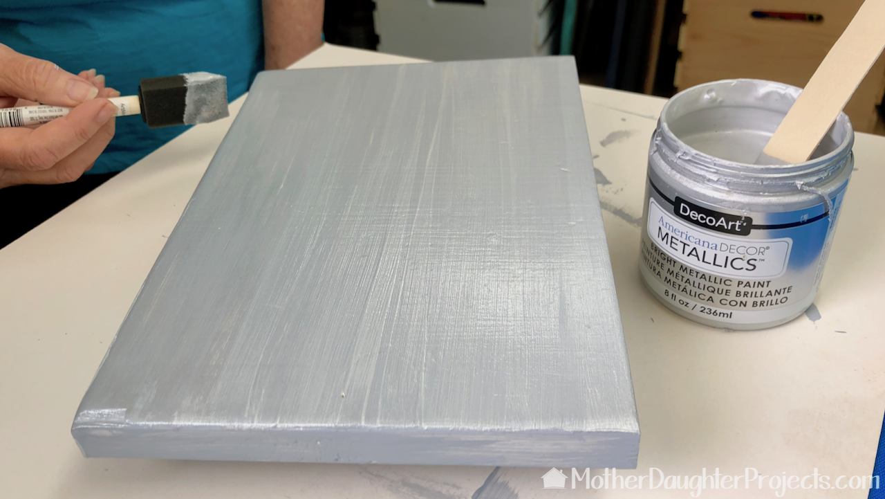 Use two coats of the metallic paint over the base coat. 