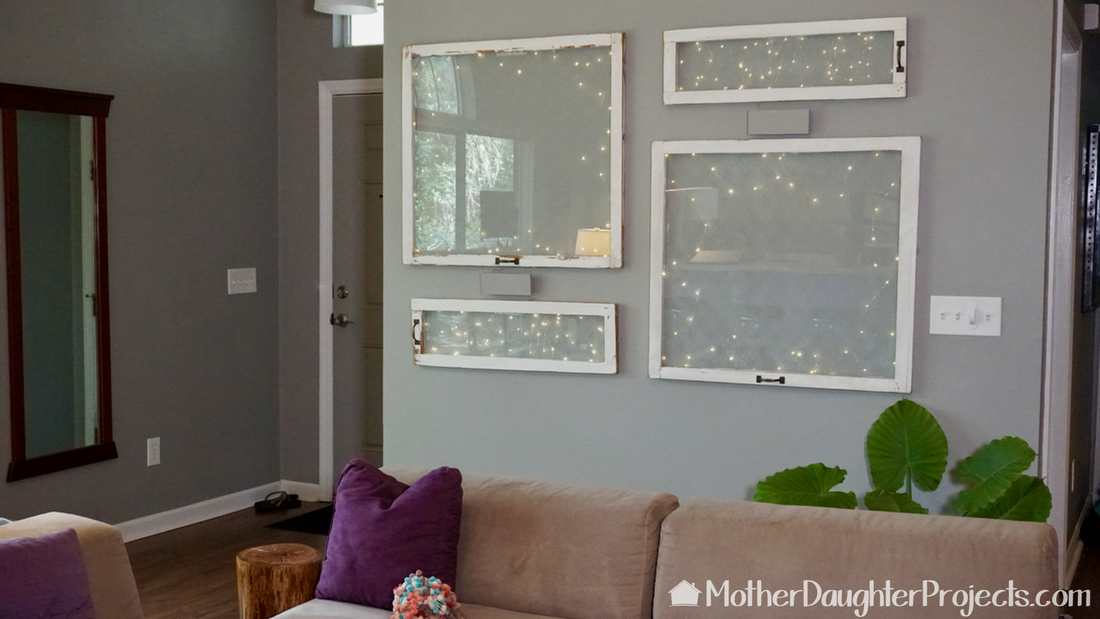 Learn how to repurpose and reuse old windows. See how to use lace as a stencil for a subtle and beautiful effect. See how to hang them with French cleats and get some ideas on how to use the panes in your living room!