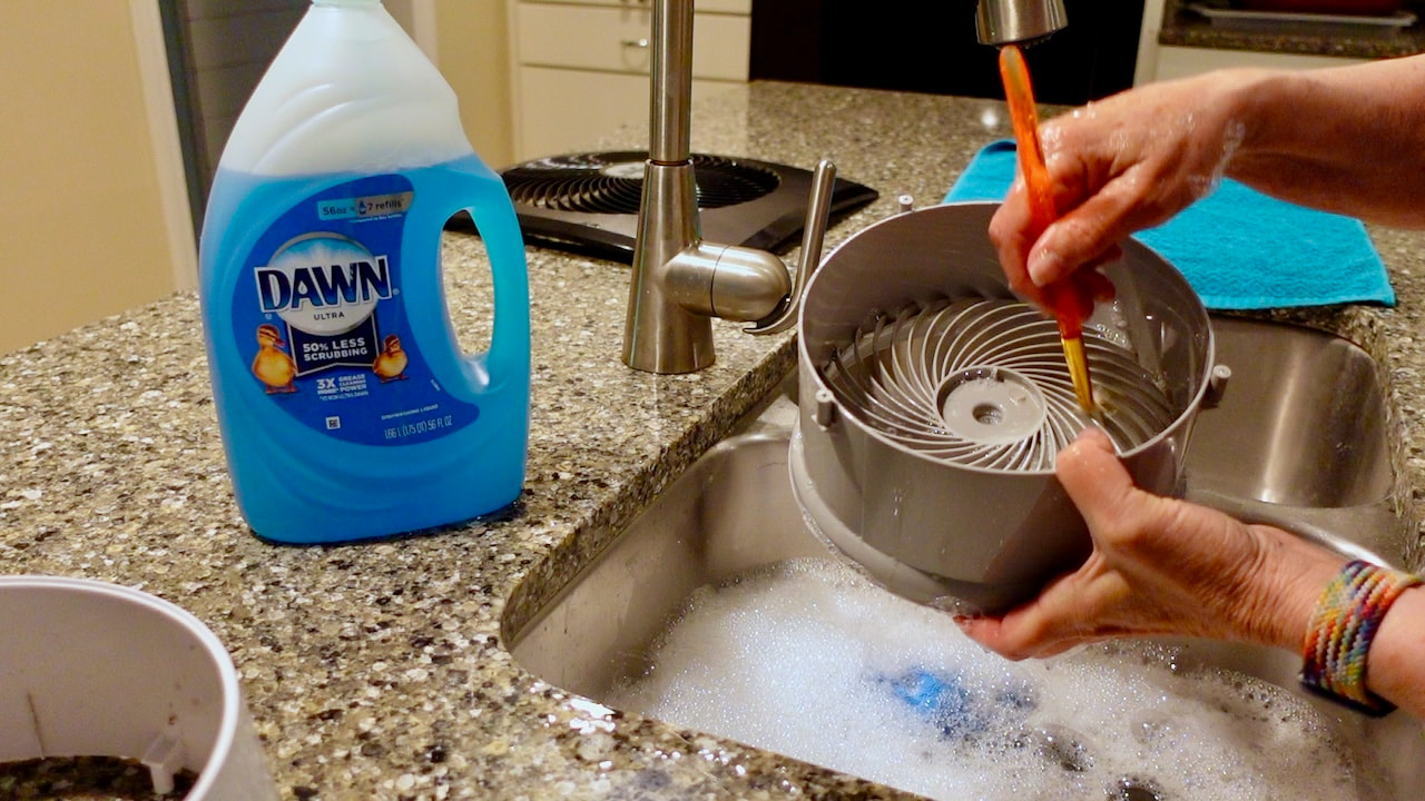 Washing the plastic parts of the Vornado Pivot5 in the kitchen sink.