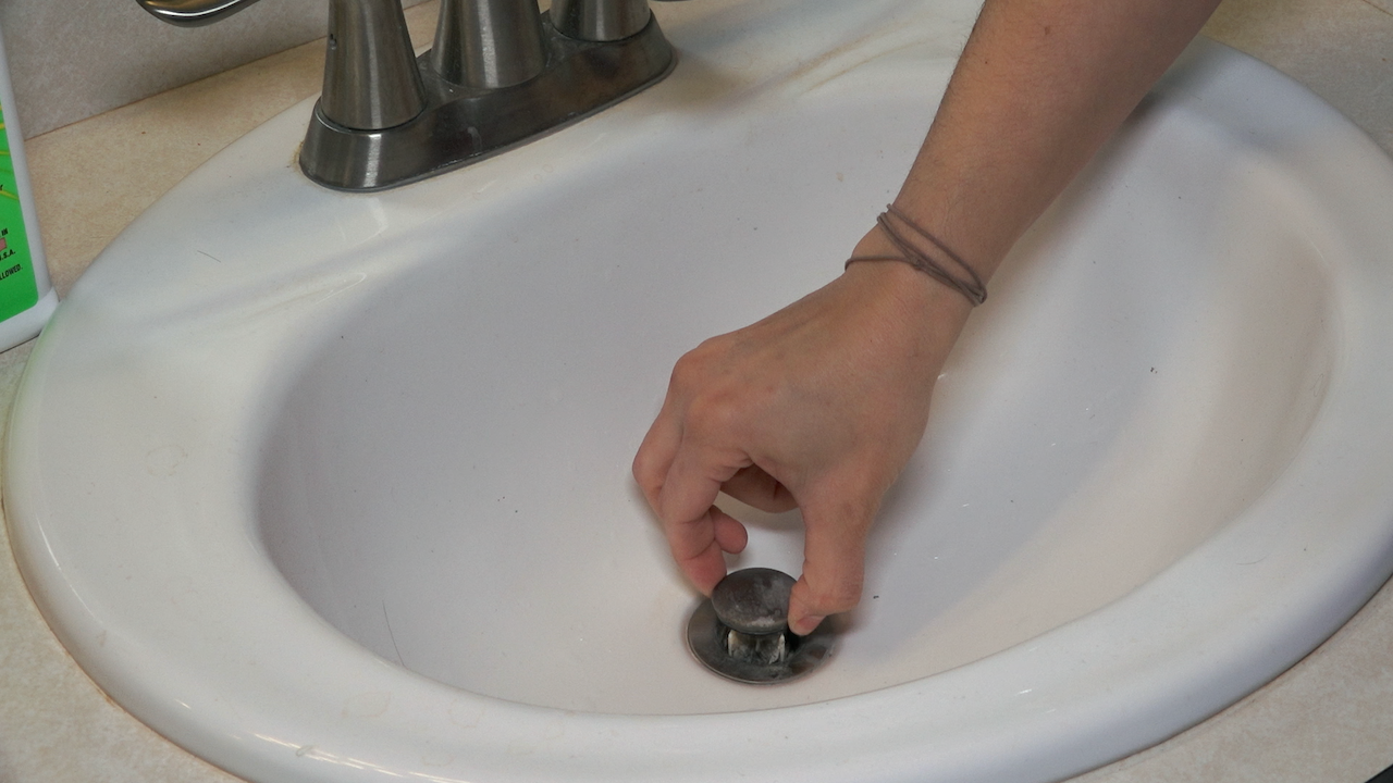 removing the plug on a bathroom sink